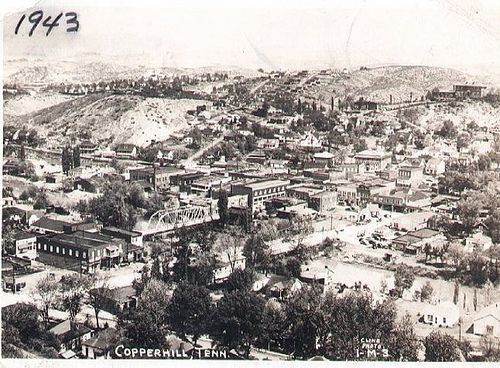 Aerial view of Copperhill, Tennessee, in 1943, showing a town nestled in a valley with buildings and hills.
