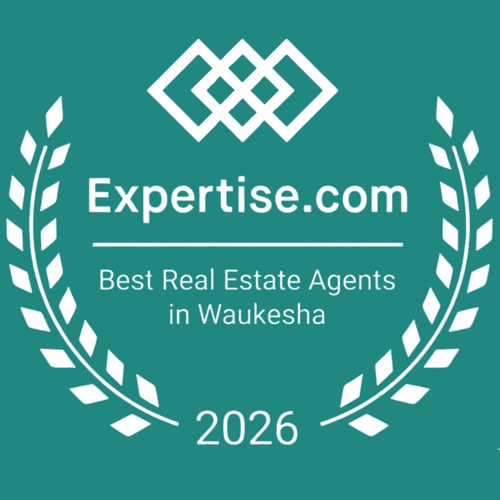 Expertise.com award badge on teal, reading “Best Real Estate Agents in Waukesha” with 2026 and laurel wreaths