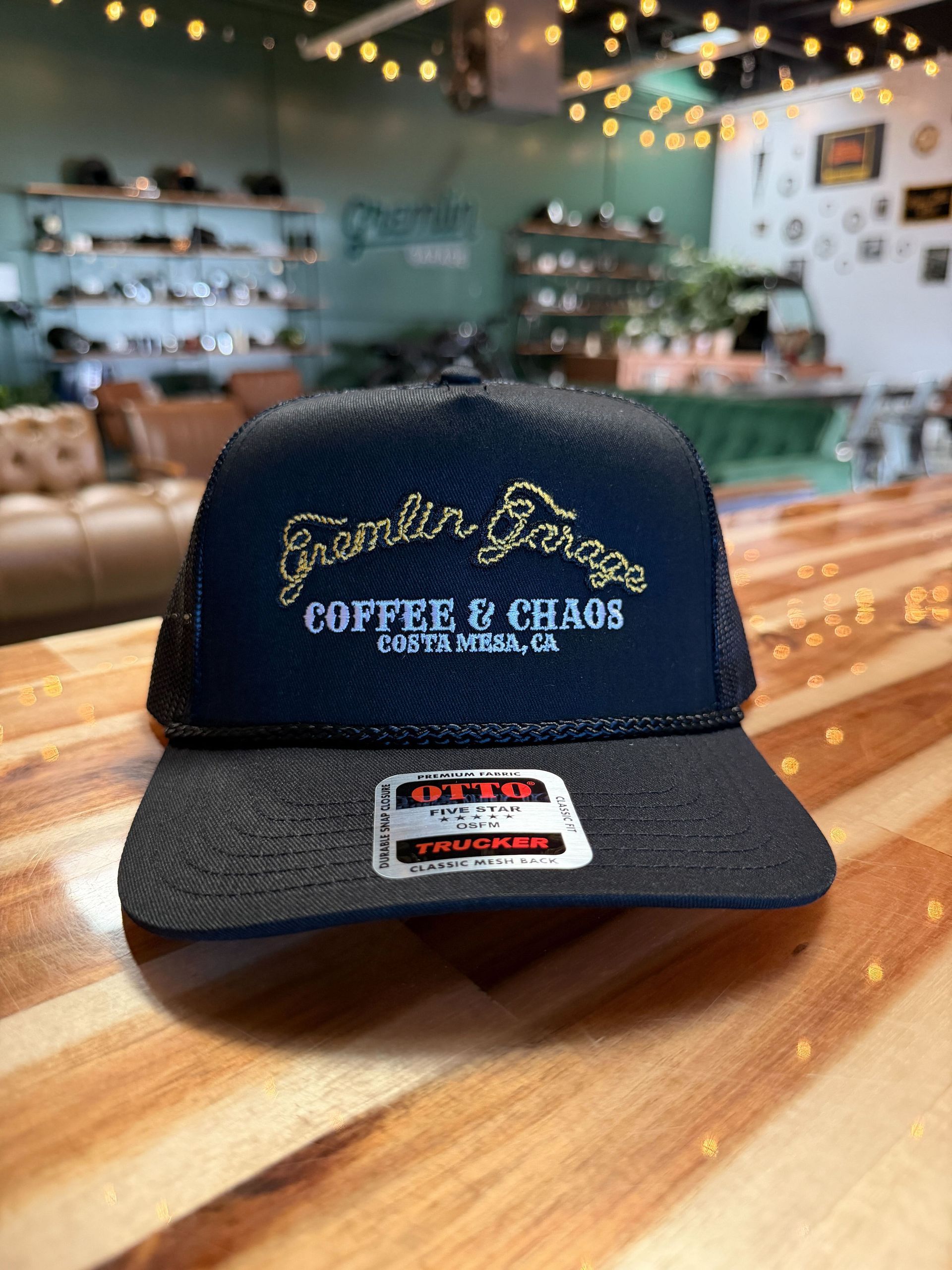 A black trucker hat with 