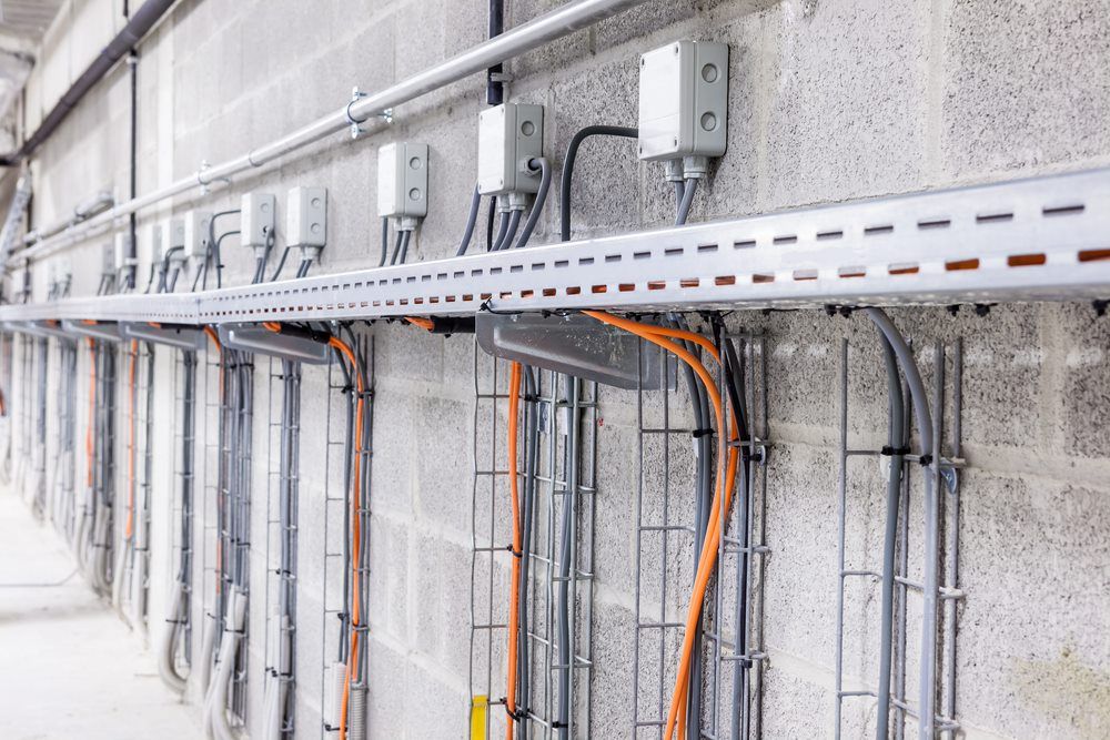 Electrical Cables On Side Of Building — Barnes Electrical in Gladstone, QLD