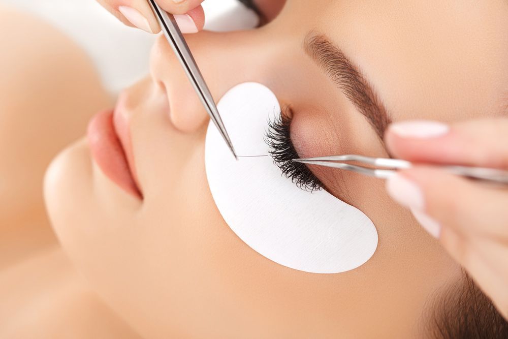 Woman Getting Eyelash Extensions In Paradiso — Paradiso Skin & Beauty Studio in Byron Bay, NSW