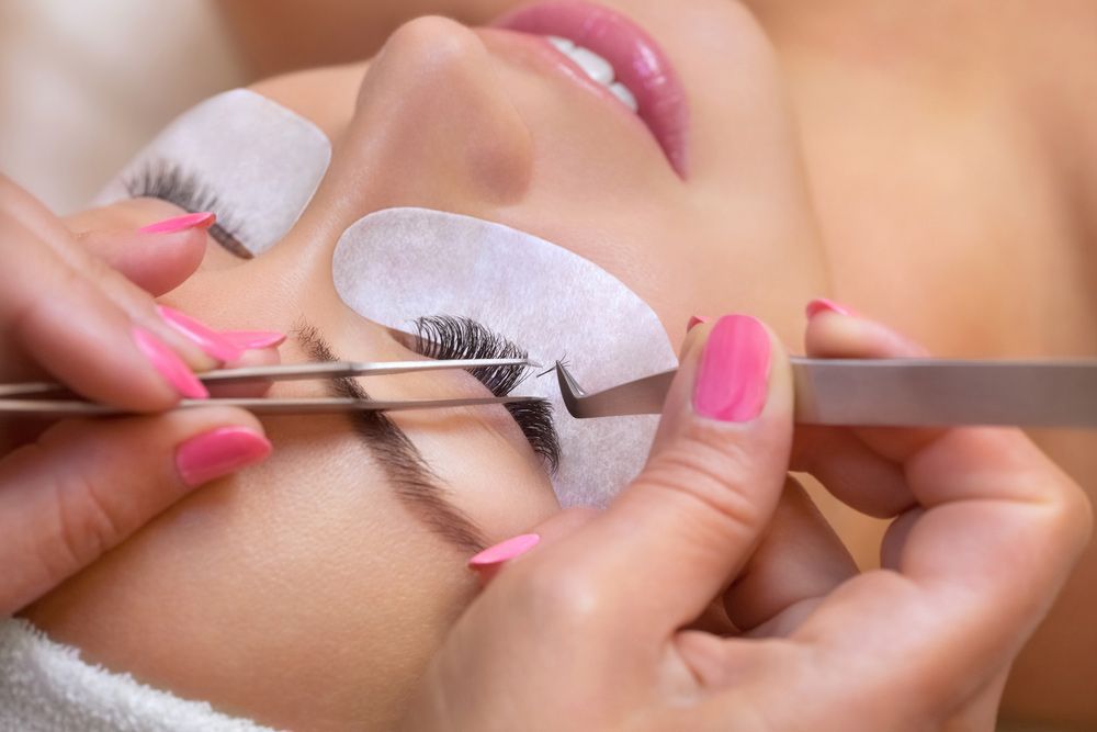 Woman Getting Eyelash Extensions — Paradiso Skin & Beauty Studio in Byron Bay, NSW