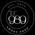 Black circular logo for “The 989 Smoke Shop” with “EST. 2022” around the border.