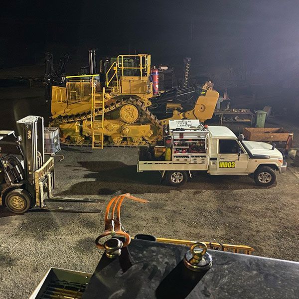 McPhee Diesel Mechanic ute next to bulldozer