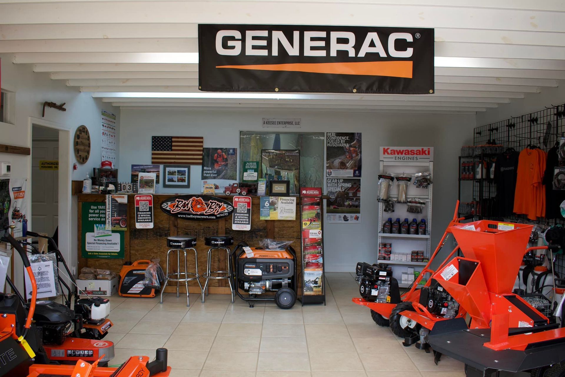 A store selling generators and lawn mowers with a sign that says generac