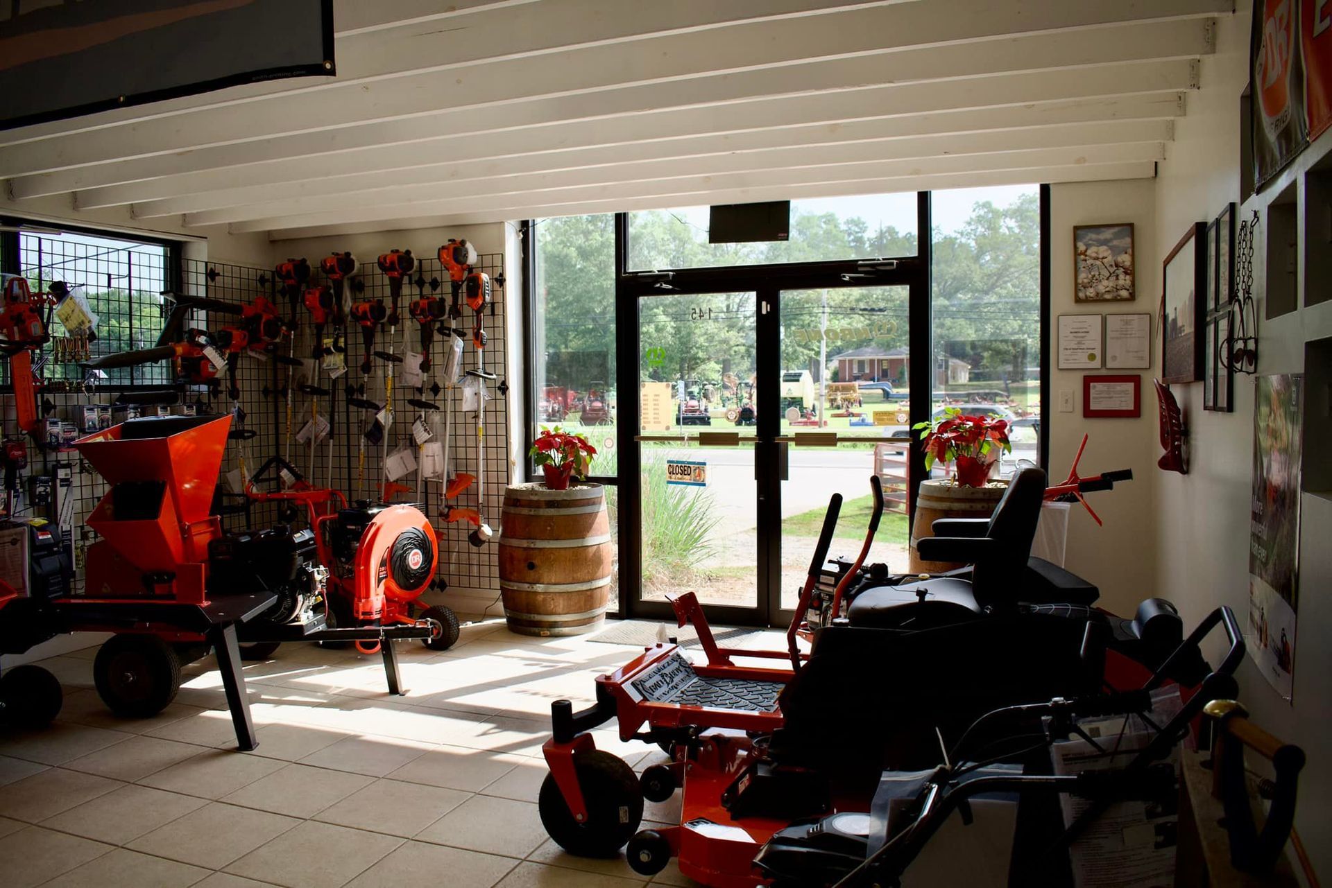 A store filled with lots of lawn mower equipment