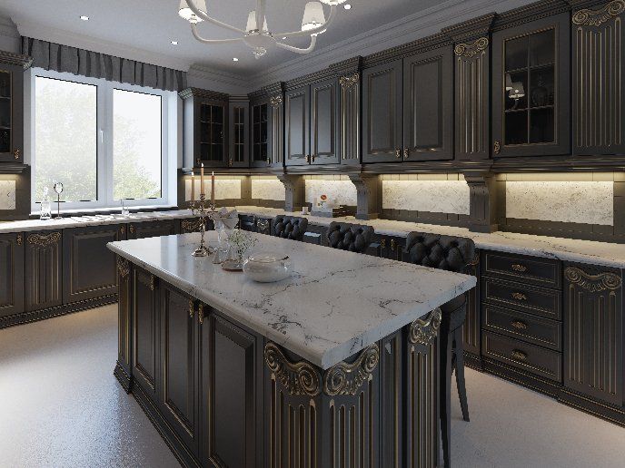 There is a large island in the middle of the kitchen.