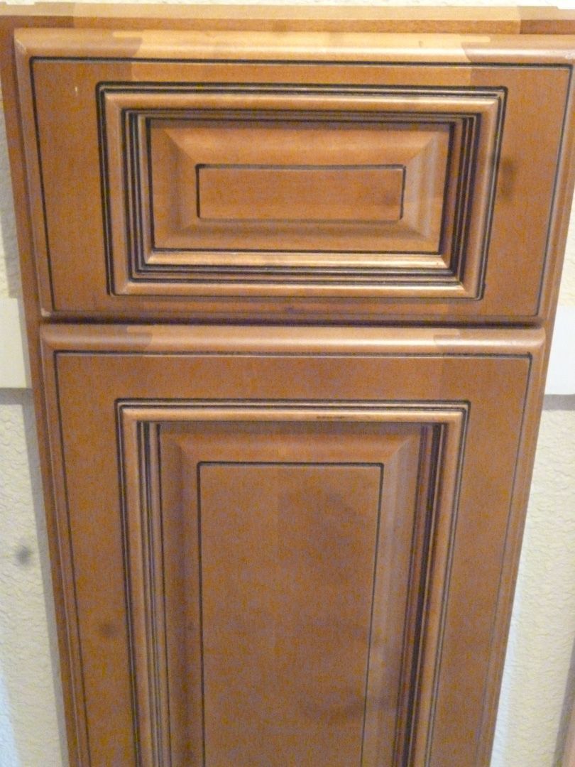 A close up of a wooden cabinet door
