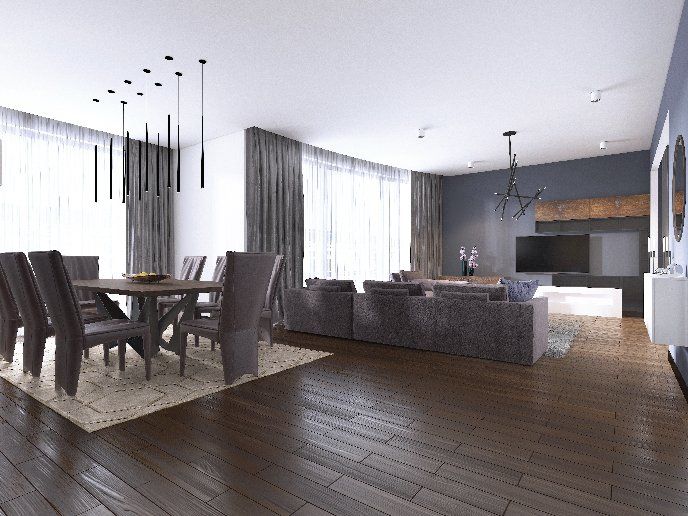 A living room with a dining table and chairs and a couch.