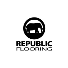 A black and white medallion logo on a white background