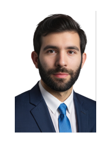 A man with a beard wearing a suit and tie
