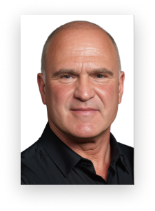 A bald man wearing a black shirt looks at the camera