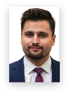 A man with a beard wearing a suit and tie