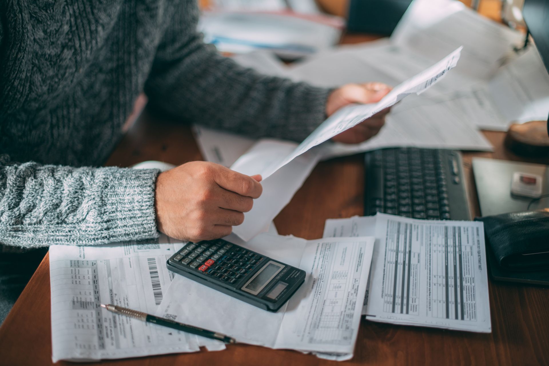 Person reviewing bills