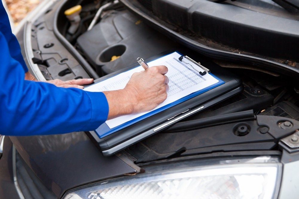 A Mechanic Inspecting Car Engine — BEB Automotive In Sutherland, NSW