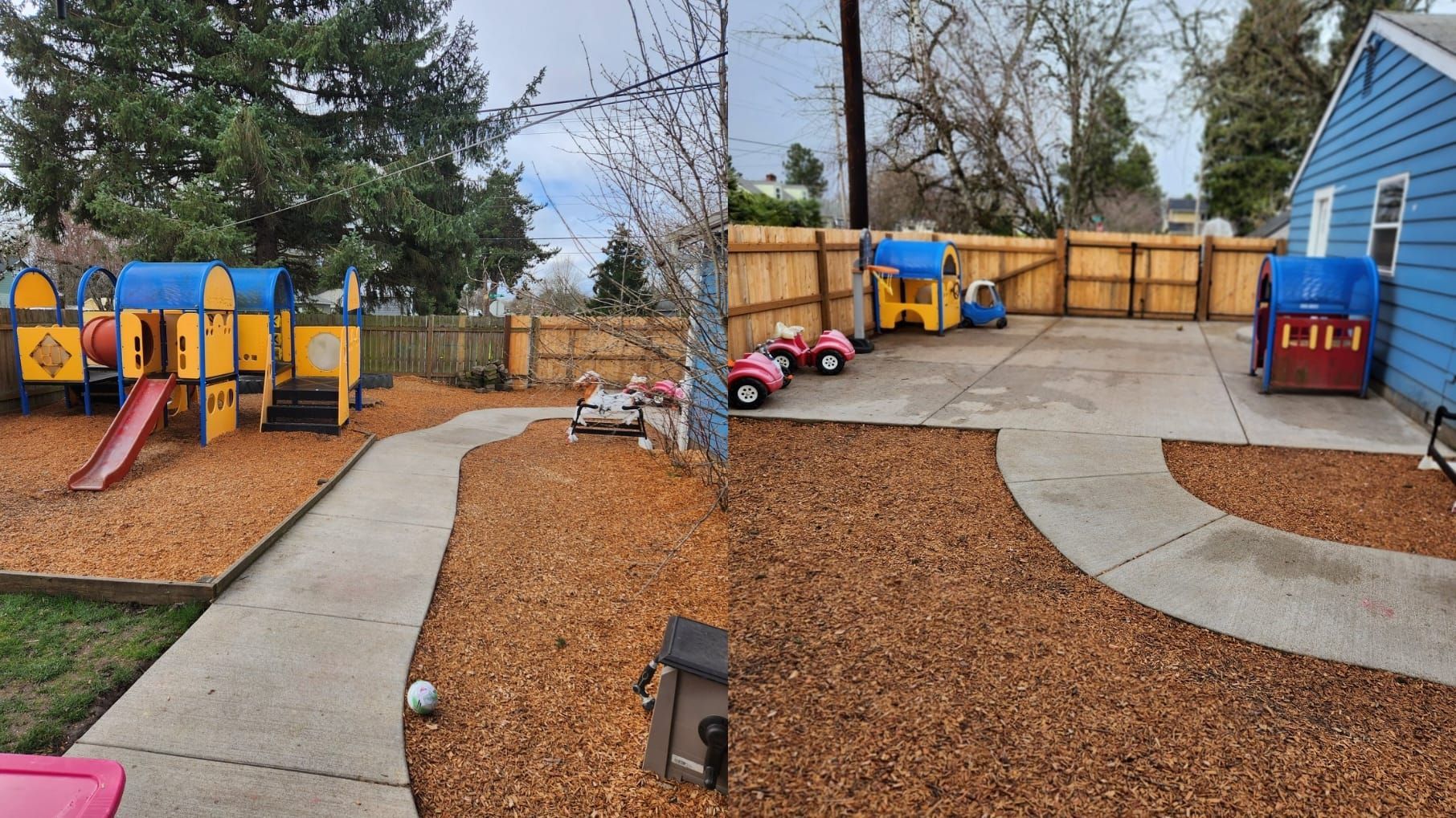 A blue house with a playground in front of it