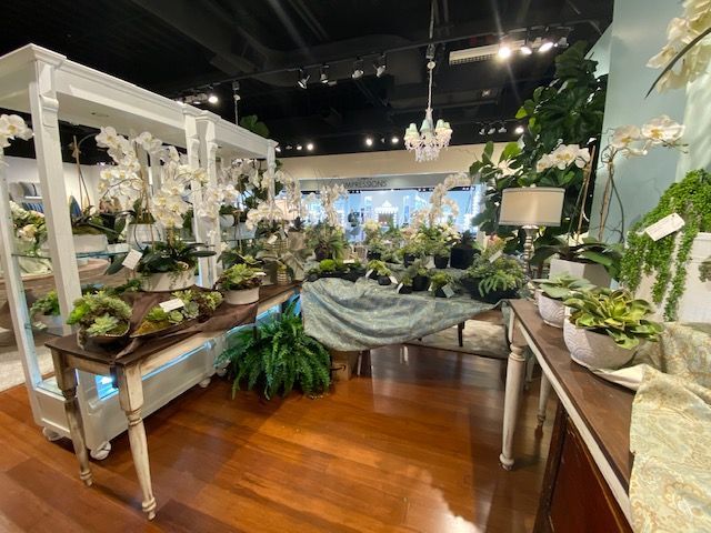 Las Vegas Booth with silk floral arrangements 