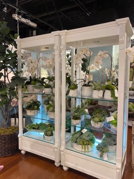 Las Vegas Booth with various silk floral arrangements 