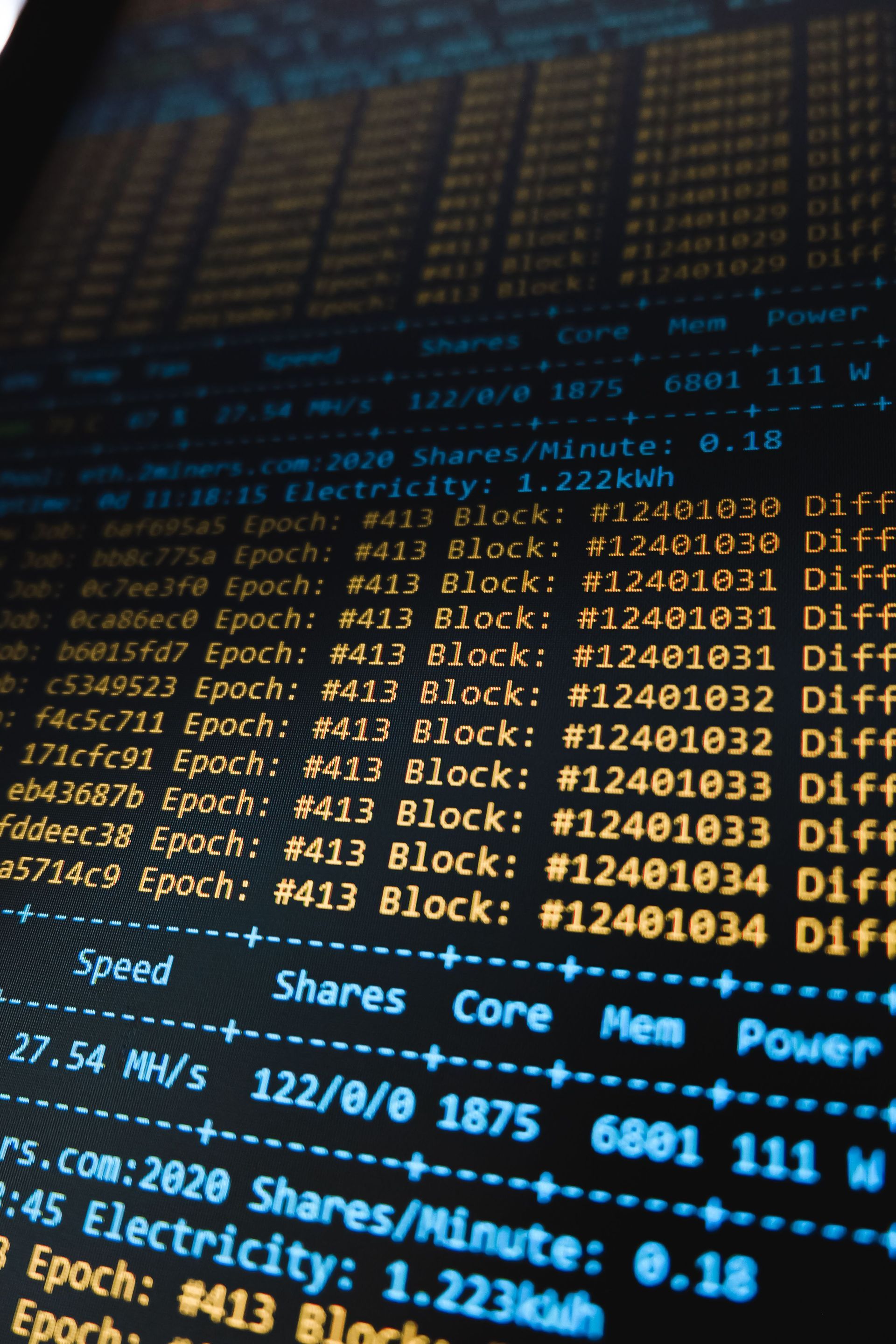 Digital mining display showing rows of code and blue-orange performance stats representing data mining by Wilsona Marketing
