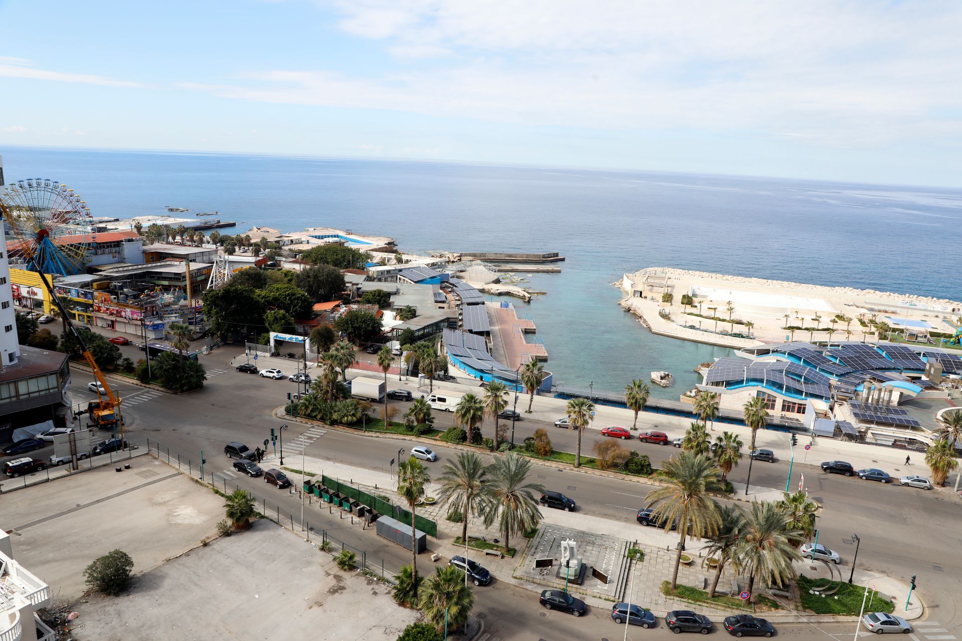 An aerial view of a city near the ocean
