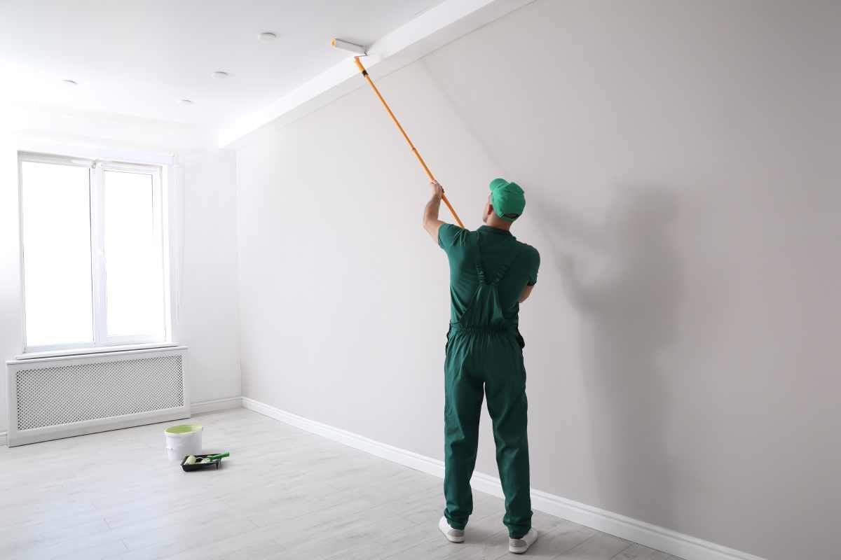 A paint contractor painting a room near Bourbonnais, Illinois (IL)