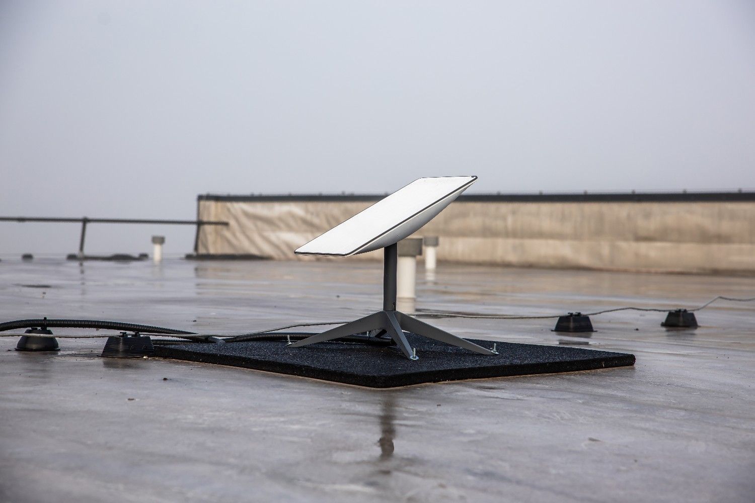 A Starlink Satellite Dish on a Rooftop — McGrath Electrical & Data in Maclean, NSW