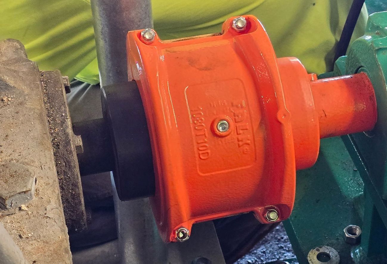 A close up of bridge gears with a chain attached to it.