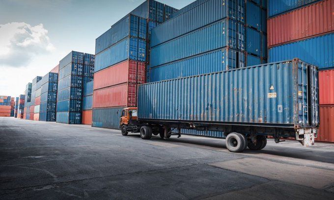 Truck Loading Up Shipping Containers