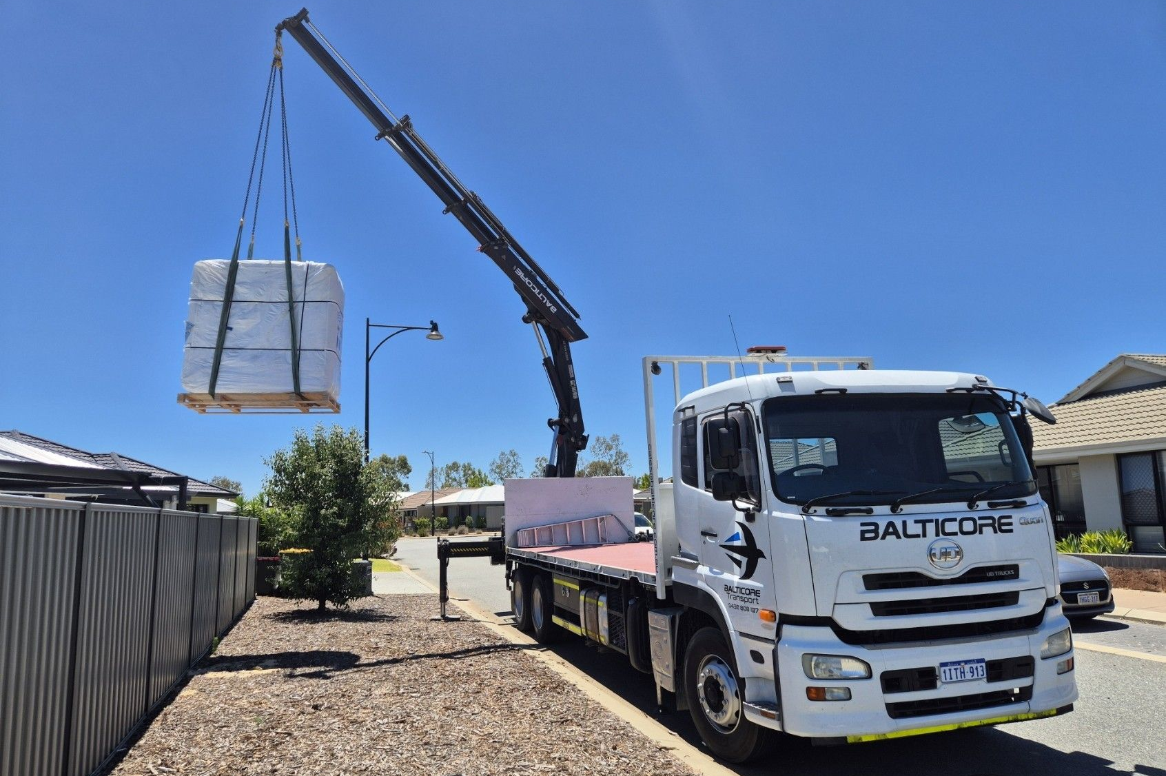 Hiab crane truck lifting equipment for site delivery in Perth