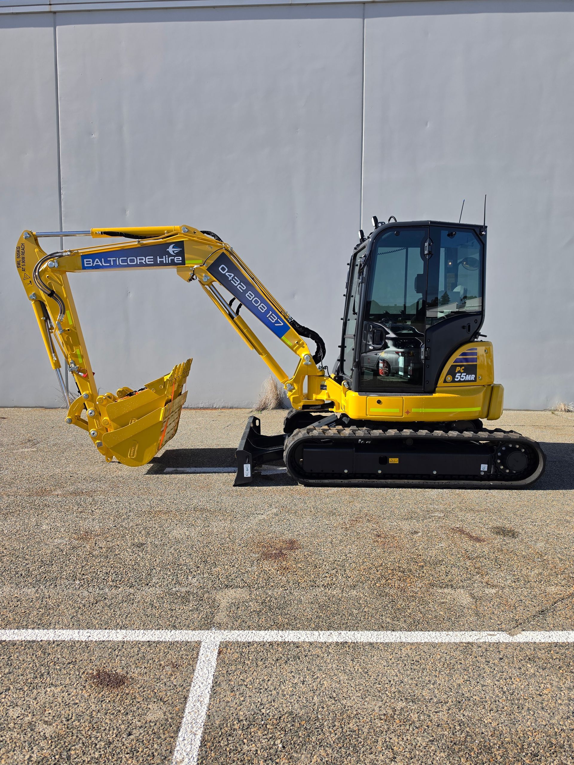 Komatsu PC55MR-5 5.5 tonne cabin excavator for wet and dry hire in Perth