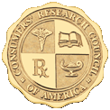 Golden circular seal of the American Research Council with text and symbols in four quadrants