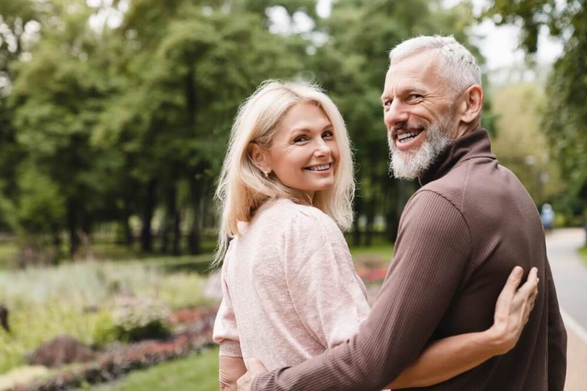 A Couple Walks Through a Park — Killara Dental in East Killara, NSW