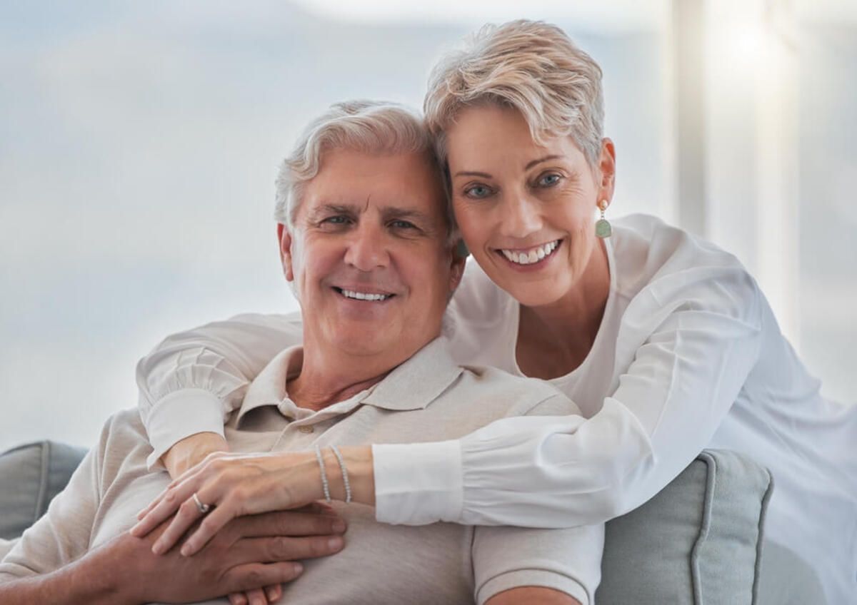 A Smiling Couple Embrace — Killara Dental in East Killara, NSW