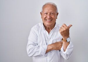 A Person Wearing a White Button-down Shirt Smiling — Killara Dental in East Killara, NSW