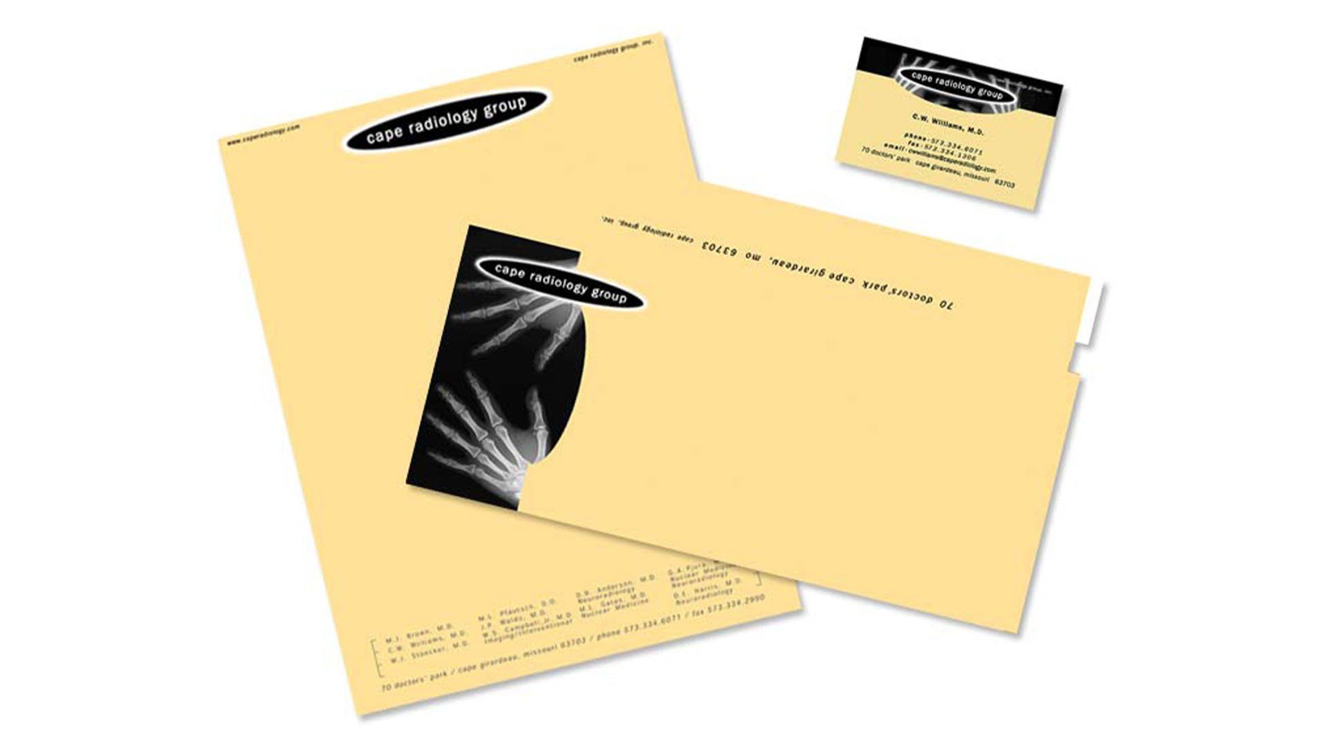 A letterhead envelope and business card for a company
