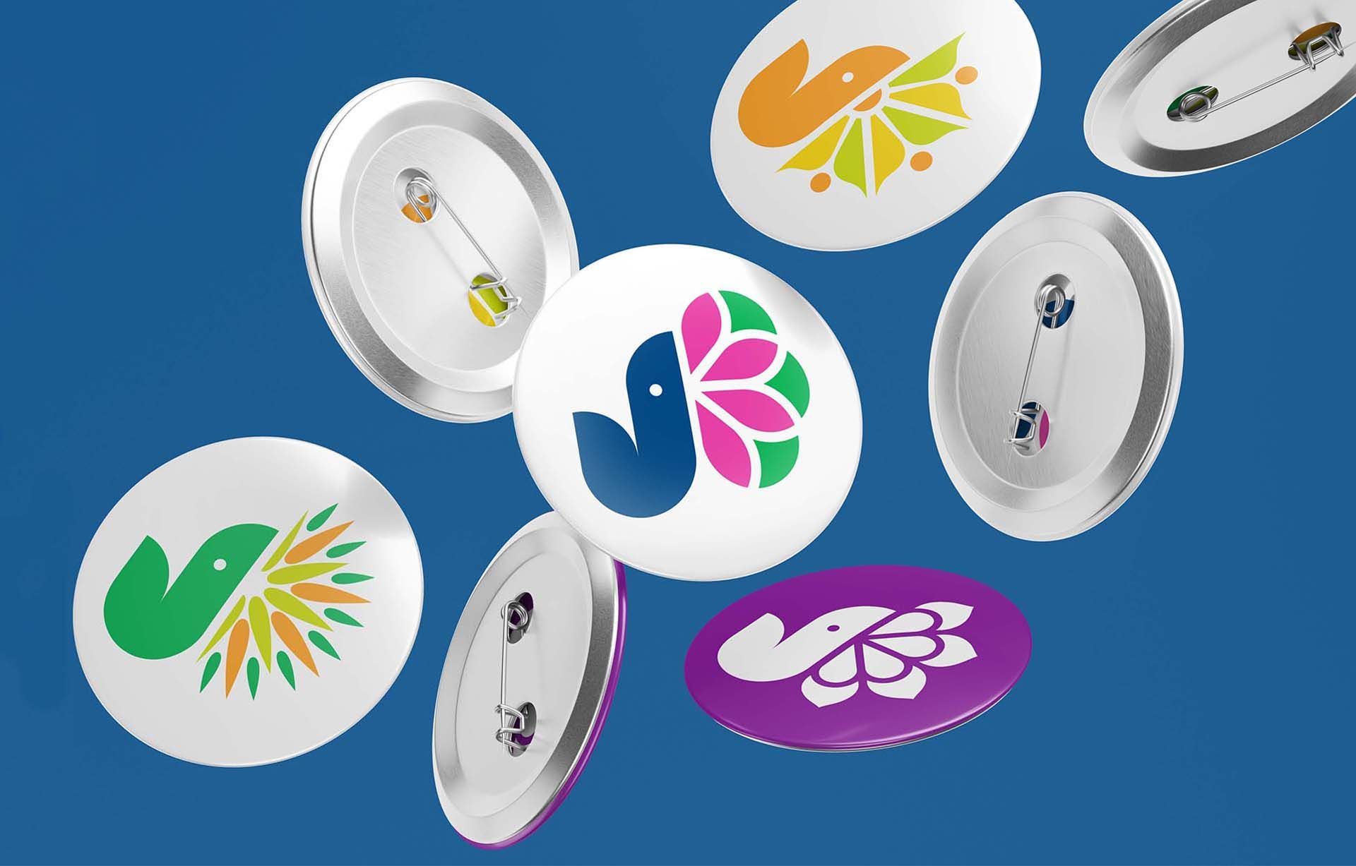 Round badges with colorful butterfly and leaf designs on a blue background