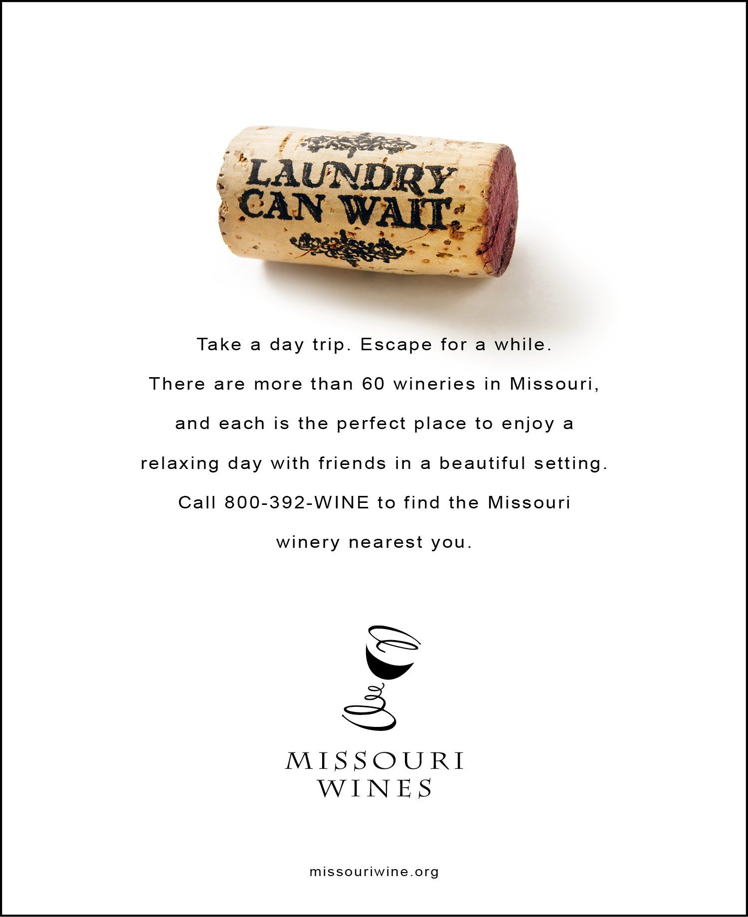 An advertisement for missouri wines with a cork that says laundry can wait