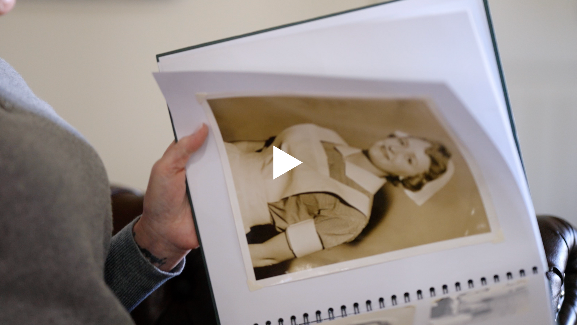 Vintage photo of a nurse in a photo album.