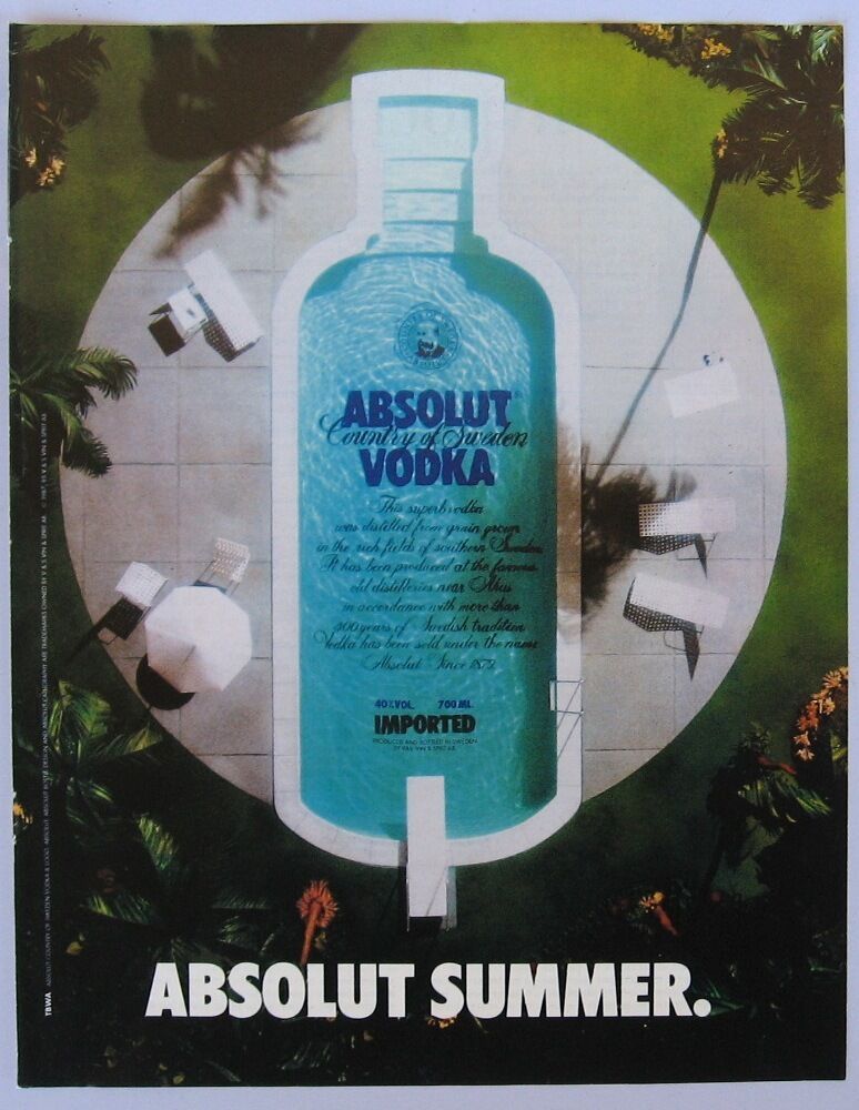 A bottle of absolut vodka in the shape of a pool