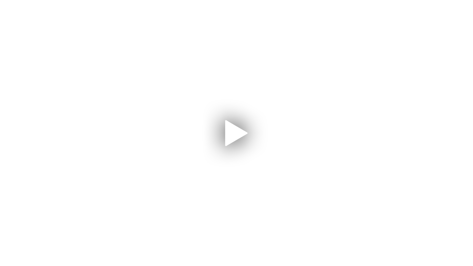 A white play button with a shadow on a white background.