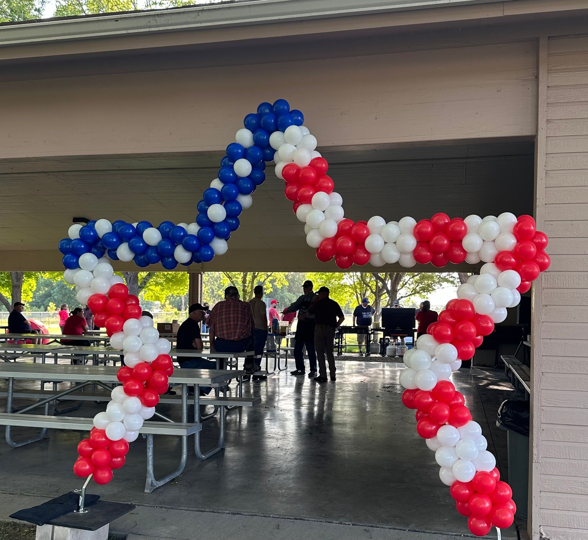 Red white and blue balloons in the shape of a star