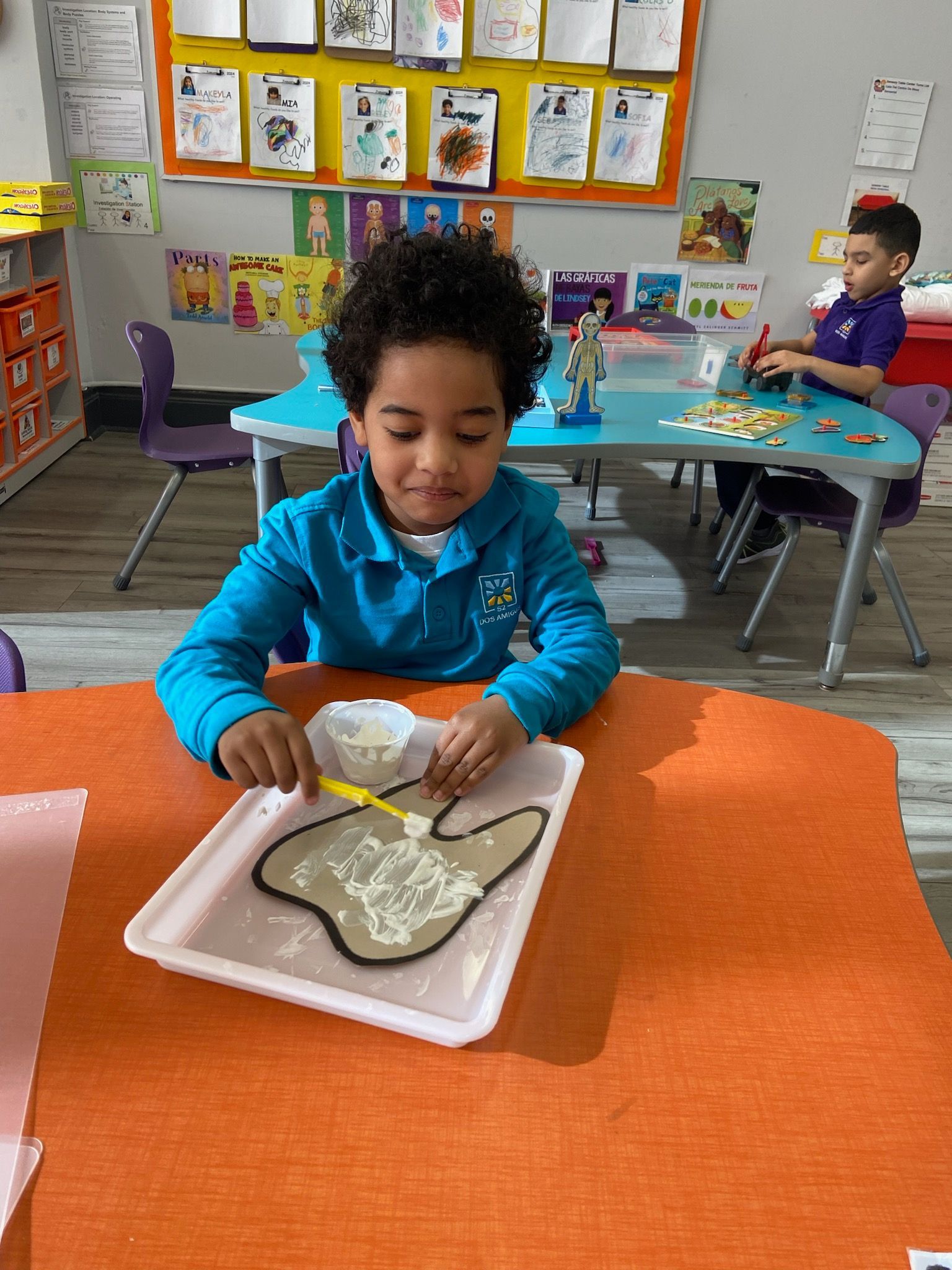 students in classroom at school in the square bilingual early childhood center
