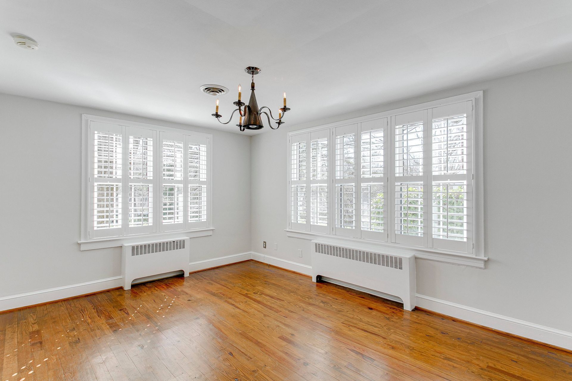 Two sets of Hunter Douglas interior shutters in a room near Spokane, Washington (WA)