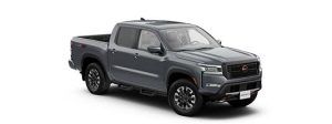 Camioneta GMC gris sobre fondo blanco, vista frontal izquierda en ángulo