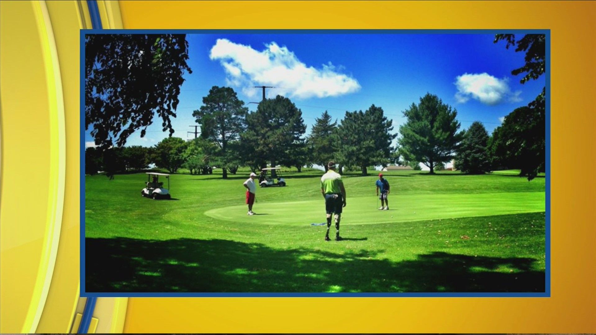 A group of people are playing golf on a sunny day