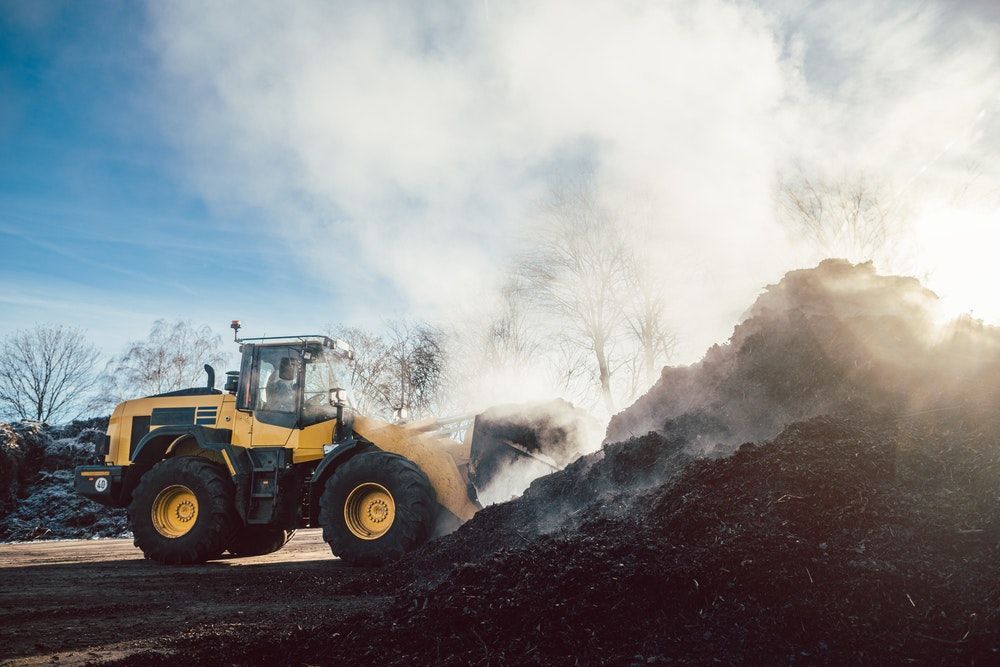 Earthmoving machinery operating on a civil works site