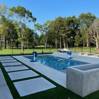 concrete pool pavers firepit in Nashville backyard