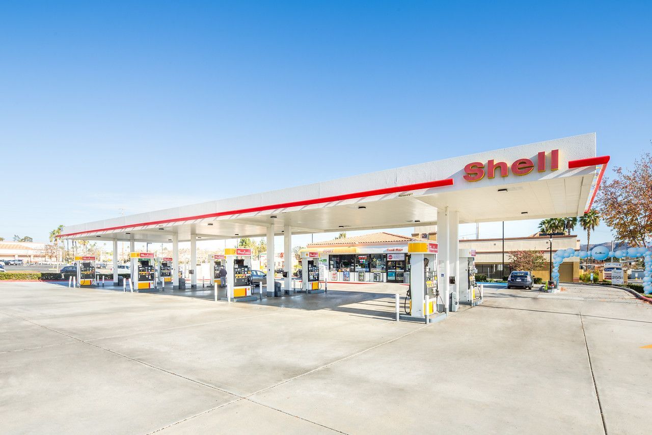Shell gas station canopy and pumps on a sunny day