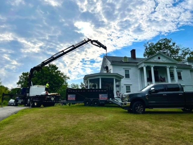 Worker Talking To Couple — Windsor, CT — HIG Roofing & Construction LLC Worker Talking To Couple — Windsor, CT — HIG Roofing & Construction LLC