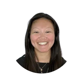 A woman wearing glasses and a black shirt is smiling